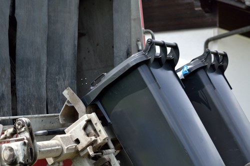 Heavy machinery removing demolition waste