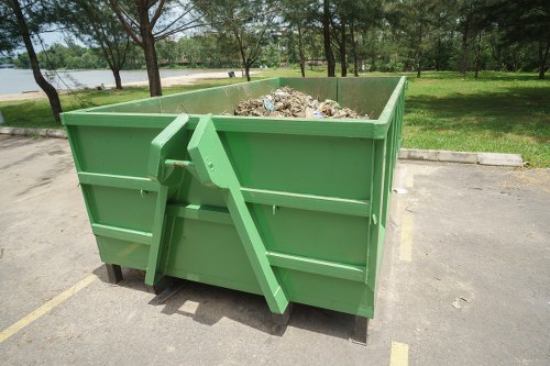 Happy customers using domestic skip hire services